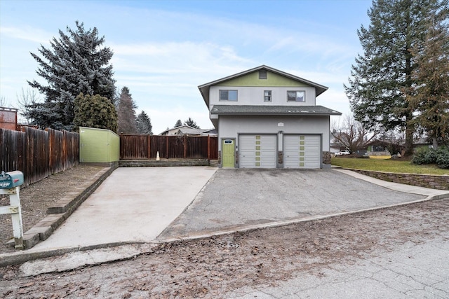 view of side of property with a garage