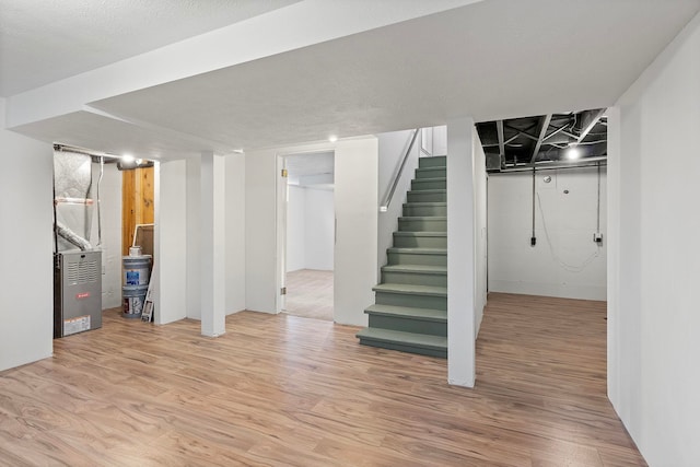 basement featuring wood-type flooring