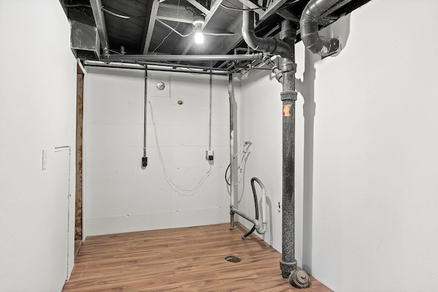 basement featuring hardwood / wood-style flooring