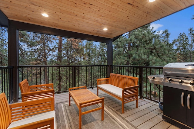 wooden deck featuring an outdoor hangout area