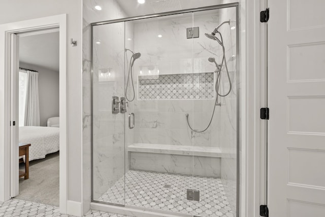 bathroom featuring an enclosed shower