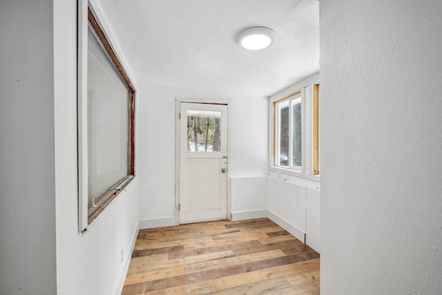 doorway featuring light wood-type flooring