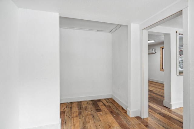 interior space featuring an AC wall unit