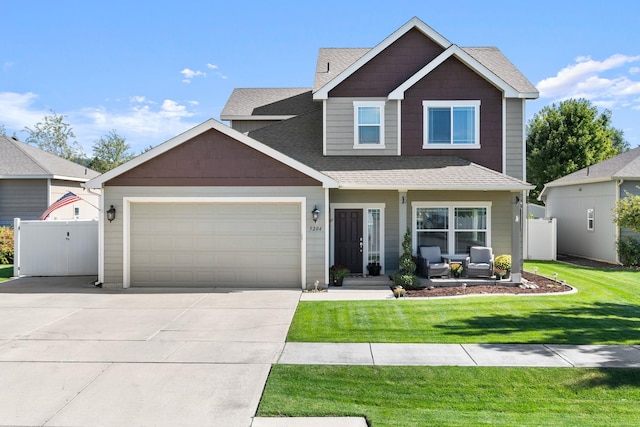 craftsman-style house with a front lawn