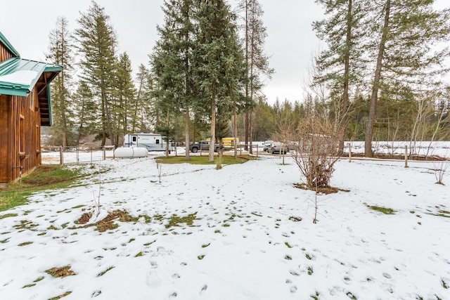 view of yard covered in snow