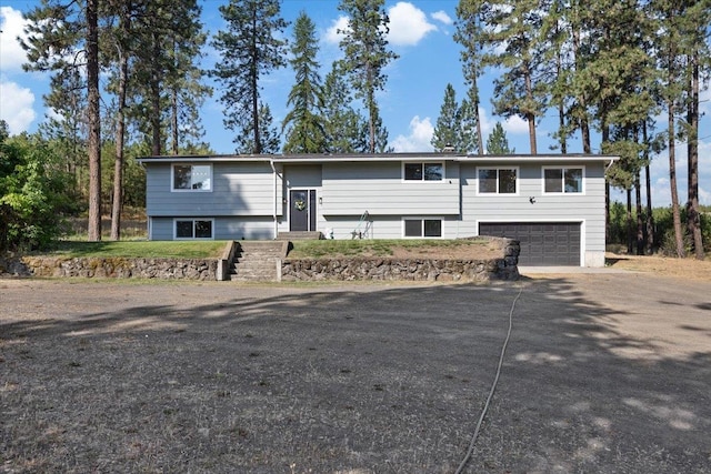 raised ranch with a garage