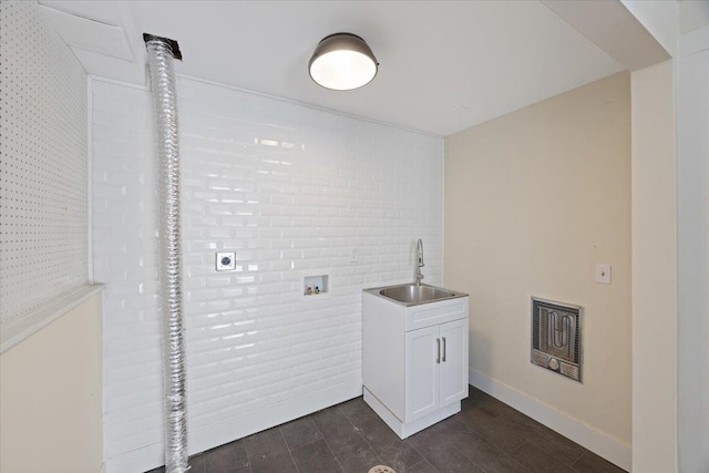 washroom featuring sink, hookup for an electric dryer, and hookup for a washing machine