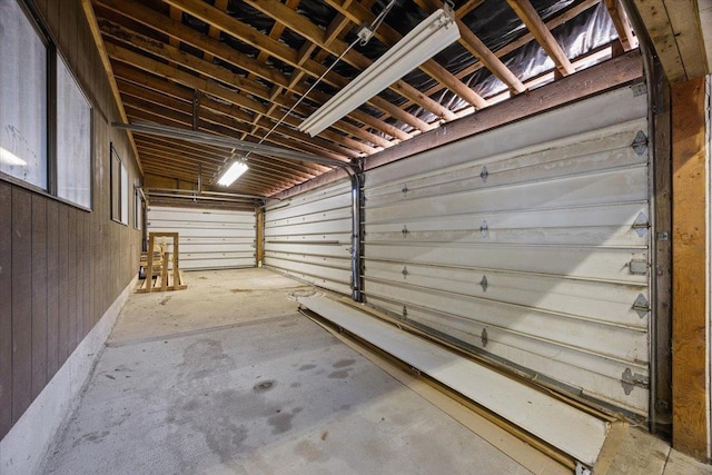 garage with wood walls