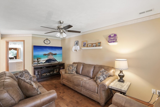 living room featuring ceiling fan, dark hardwood / wood-style flooring, and ornamental molding