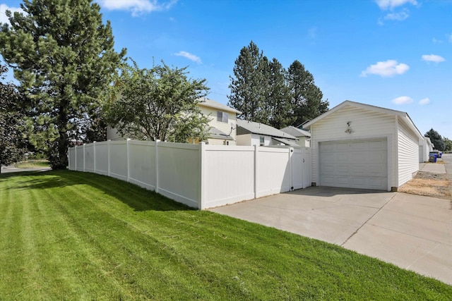 view of yard with a garage