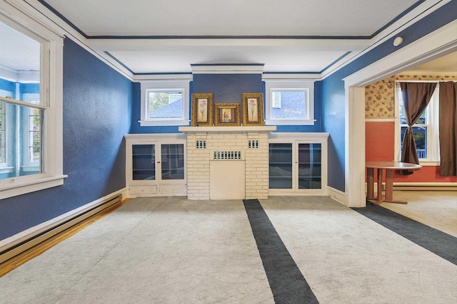 interior space with a baseboard heating unit, ornamental molding, and carpet flooring