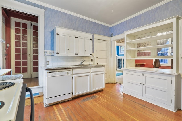 kitchen with white cabinetry, dishwasher, light hardwood / wood-style flooring, and sink