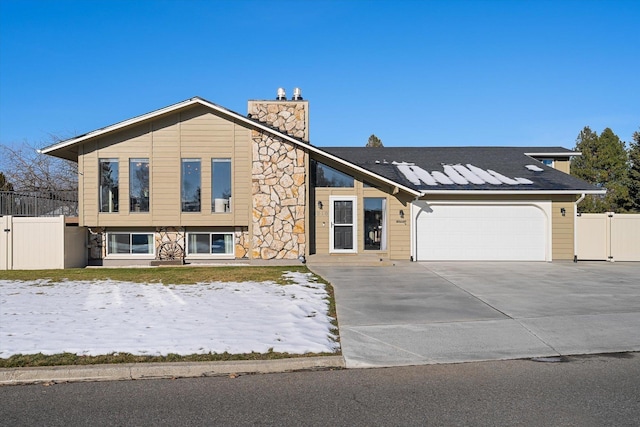 tri-level home featuring a garage