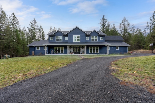 craftsman house featuring a front yard