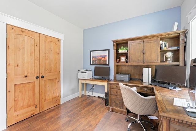 office space with dark hardwood / wood-style floors