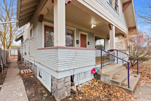 entrance to property featuring covered porch