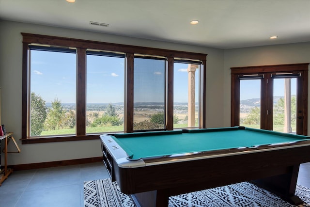 recreation room featuring light tile patterned floors, plenty of natural light, and pool table