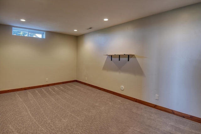 spare room with carpet