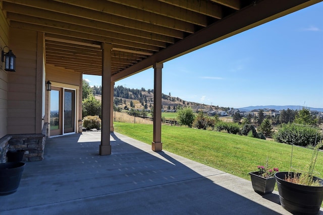 view of patio / terrace featuring a mountain view