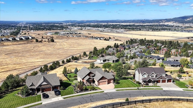 drone / aerial view featuring a mountain view