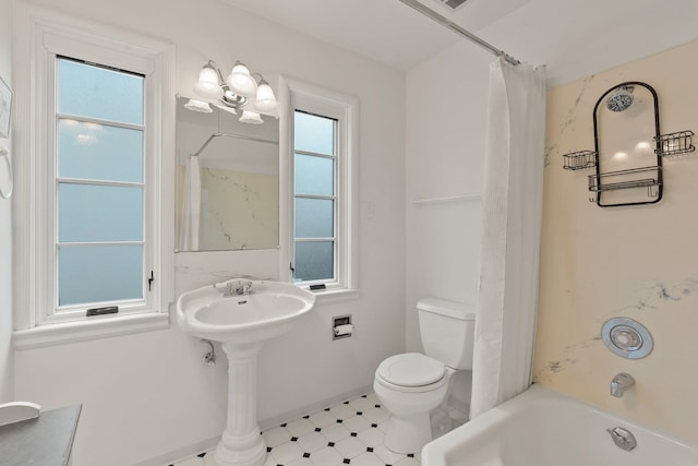 bathroom with toilet and shower / bathtub combination with curtain