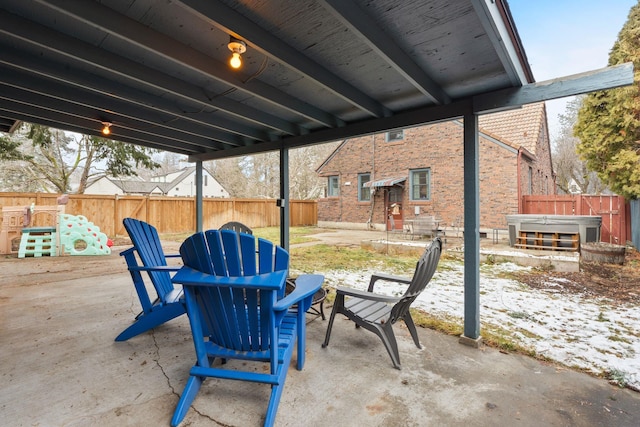 view of patio / terrace featuring a hot tub