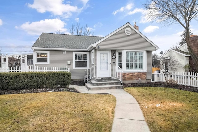 bungalow with a front yard