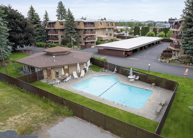 view of swimming pool with a patio area