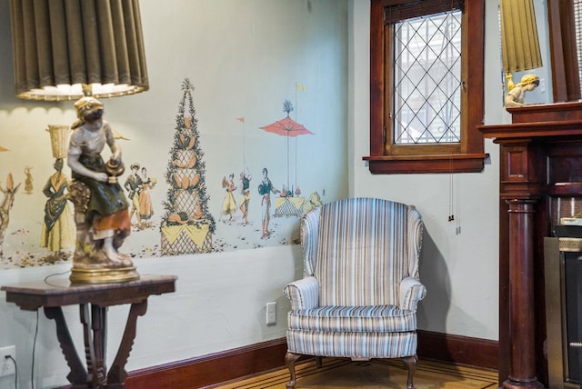 sitting room featuring baseboards