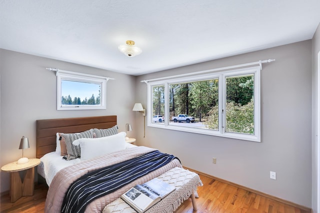 bedroom featuring light wood-type flooring