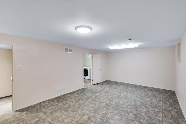 unfurnished room featuring washer / clothes dryer