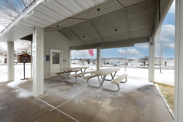 view of snow covered patio