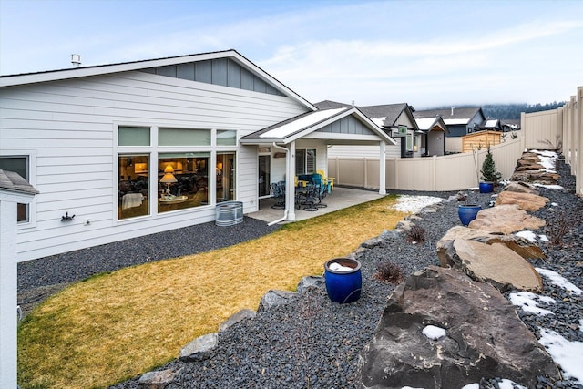 rear view of property with a patio