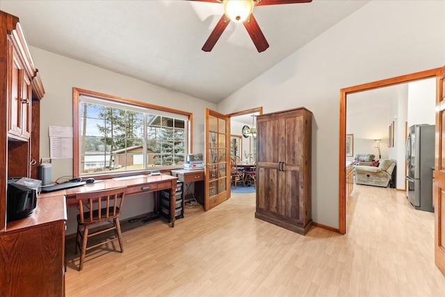 office area with ceiling fan, vaulted ceiling, and light hardwood / wood-style flooring