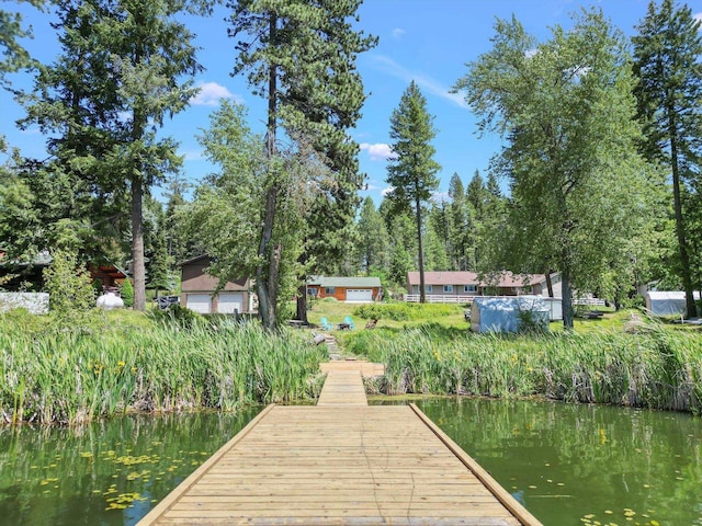 view of dock with a water view