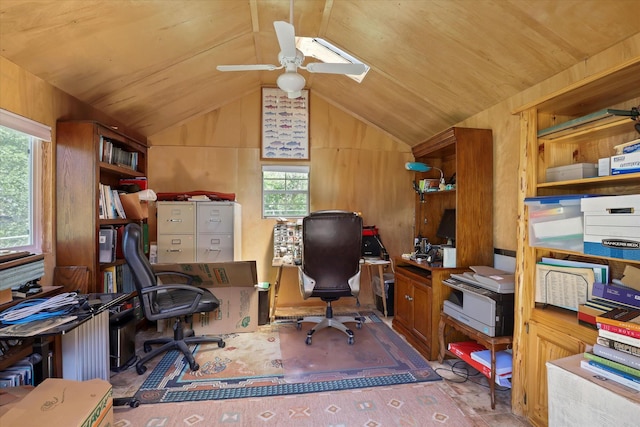 office featuring ceiling fan, a wealth of natural light, and vaulted ceiling