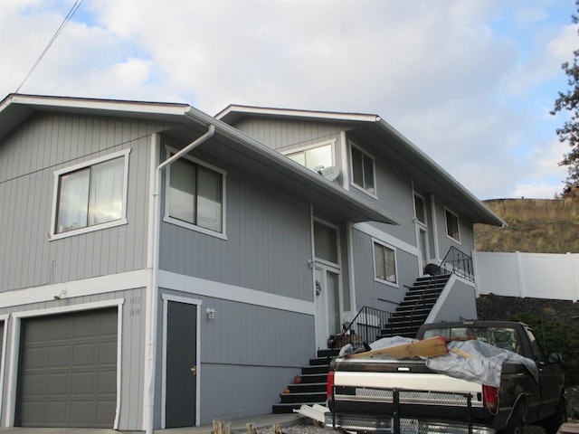 view of property exterior with a garage