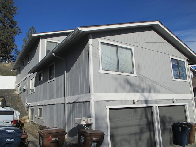 view of home's exterior with a garage