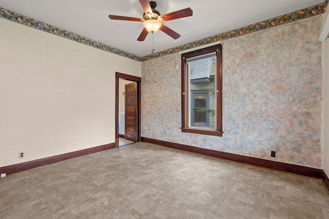 empty room featuring ceiling fan