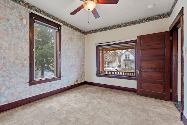 spare room with ceiling fan