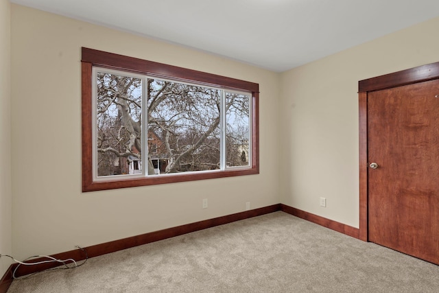 empty room featuring carpet floors