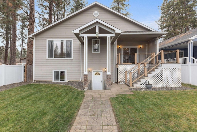 view of front of home with a front yard