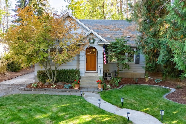 view of front of home with a front yard