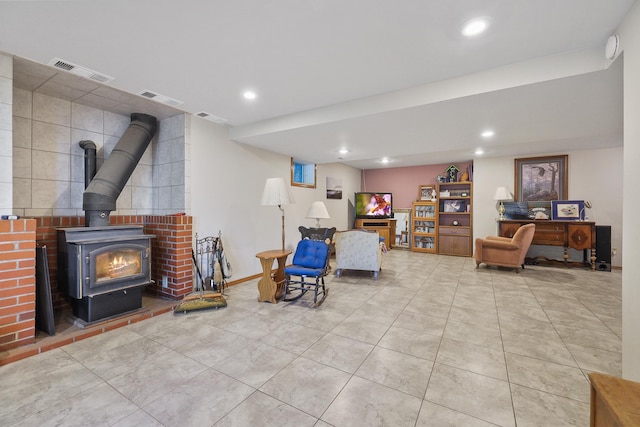 living room featuring a wood stove