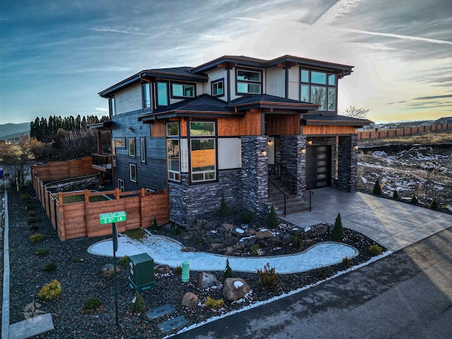 view of front of property with a garage