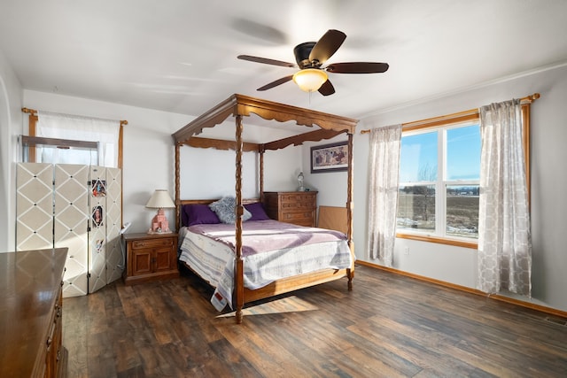 bedroom featuring ceiling fan and dark wood-type flooring