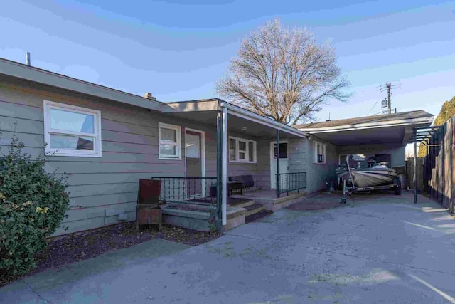 view of front of house featuring a carport