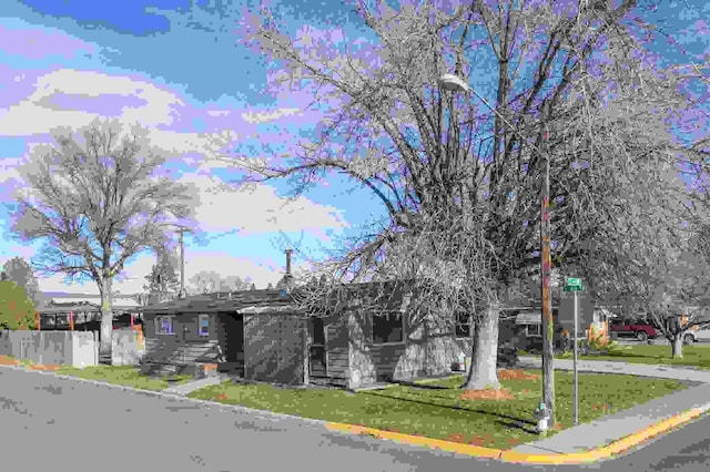 view of front of home with a front yard