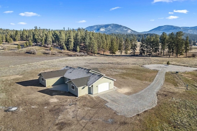 birds eye view of property featuring a rural view and a mountain view