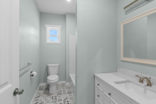 full bath featuring vanity, a tub to relax in, baseboards, walk in shower, and toilet